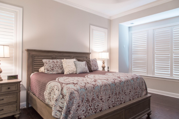 Fort Myers bedroom with light block shutters